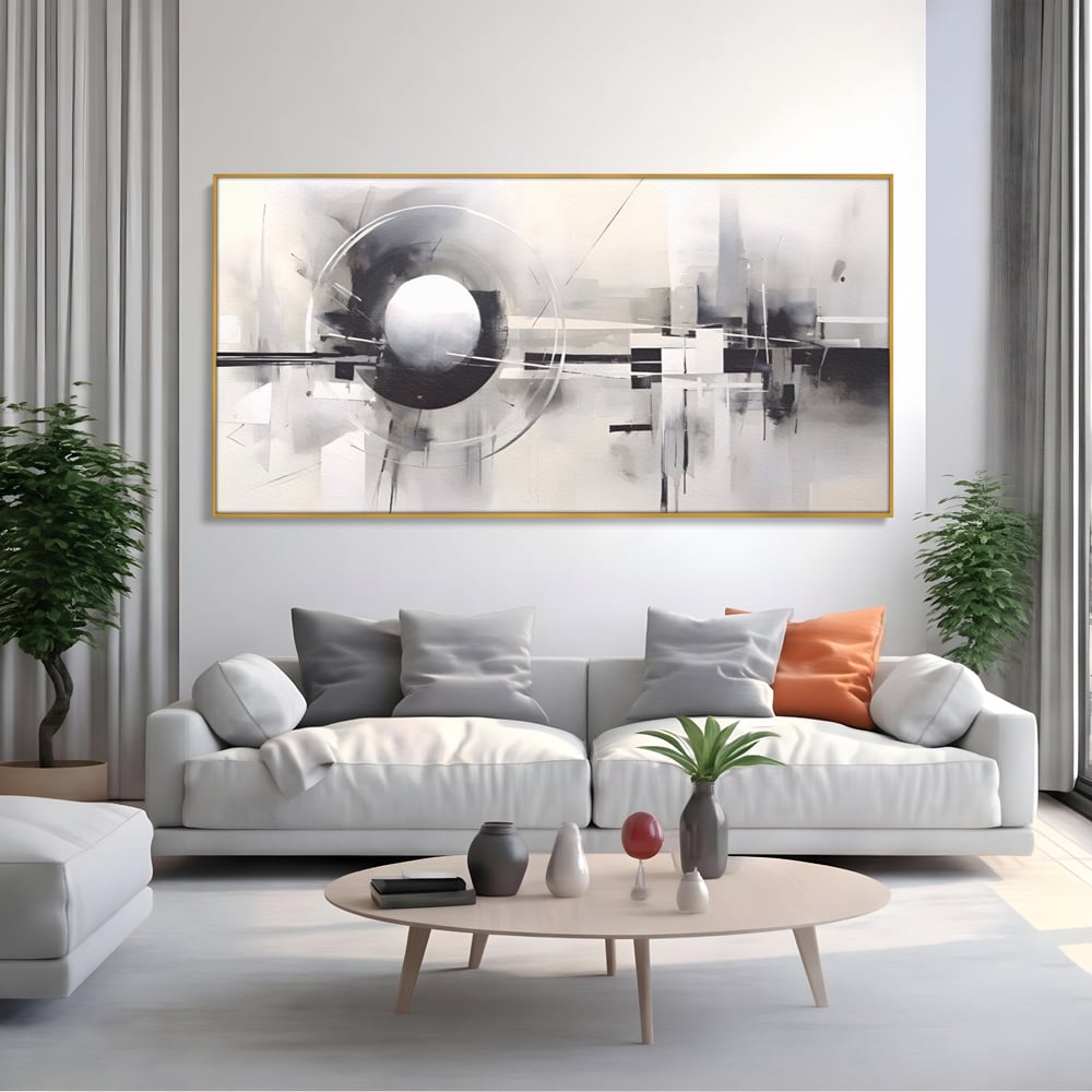 Tablou canvas cu pictura abstracta cu sfera si cercuri, in rama de aluminiu auriu, pe perete intr-un living